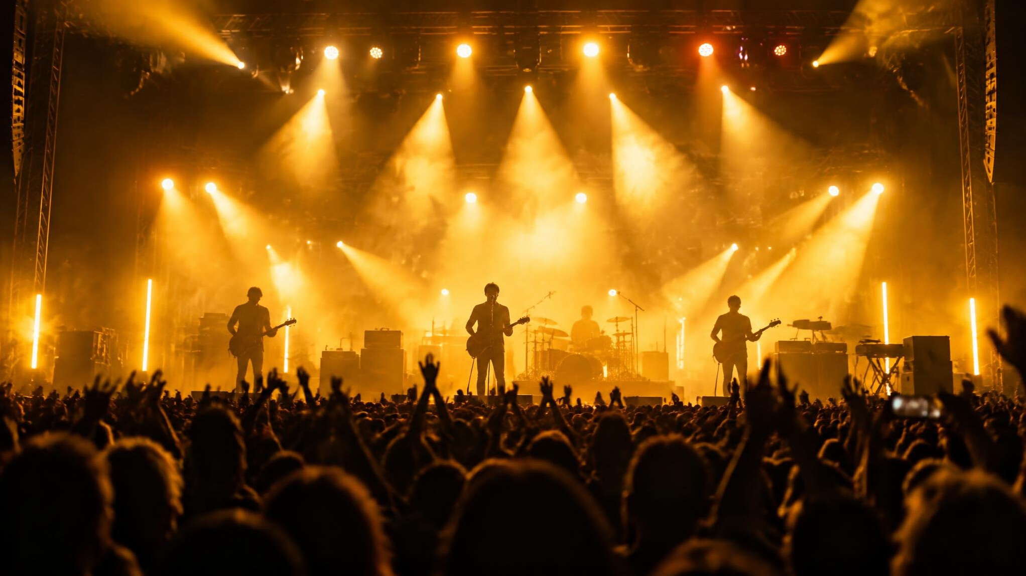 Musician performing on stage with warm stage lights